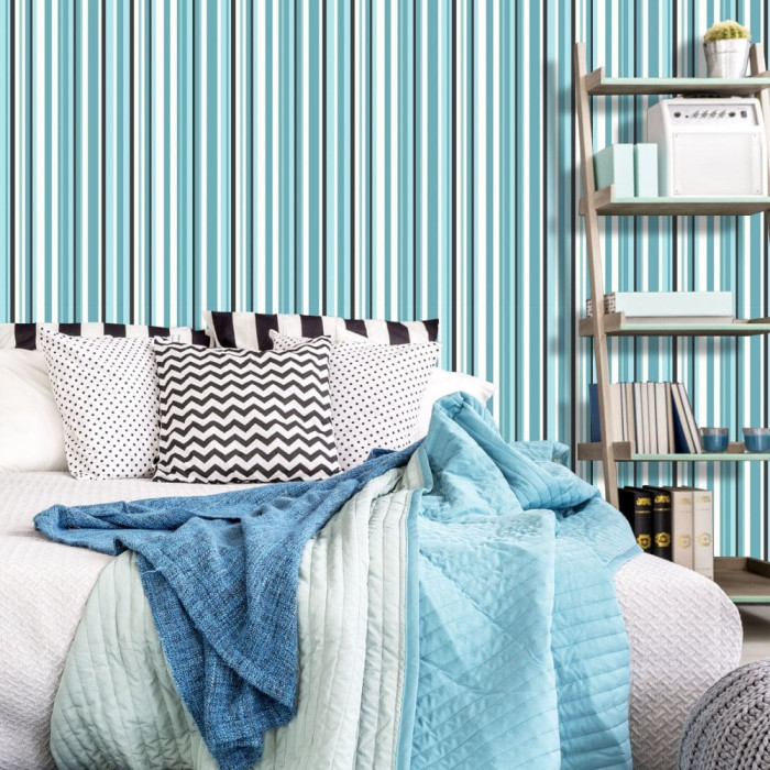 bright blue striped wallpaper in bedroom
